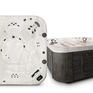 profile-apexb - The Pool & Spa Store Coast Spas hot tub featuring a white acrylic interior and dark wood-look cabinet, with multiple massage jets and ergonomic seating for full-body relaxation.