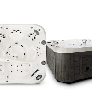 profile-elementl - The Pool & Spa Store Coast Spas 7-person hot tub with white interior shell and dark wood-style cabinet, featuring ergonomic seating, multi-jet hydrotherapy, and digital control panel.